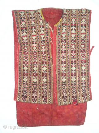 Ceremonial jacket, "bajuh" cotton, 24" long by 17" across. Iban people, Sarawak                     