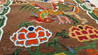 This unique carpet was specially spun during the Footok Festival, which revolves around the 450 year old Tibetan monastery of Olangchung Gola in the Kanchenjunga area of Nepal. The handcraft uses purely  ...