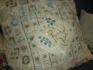 Better than average is the quality of the embroidery fragments of which this cushion was probably made in the european part of the ottoman empire 85 cm square, 34 inch   