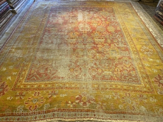 Antique Oushak rug 
Approx 9x12 feet 
Circa 1900’s 
Some old repairs low pile                    
