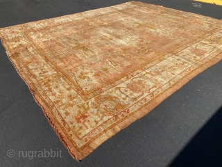 Antique Oushak rug approx 12x14 feet more pics upon request                       