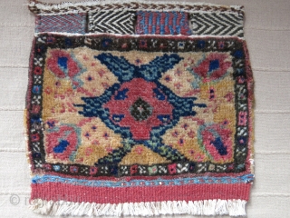 Mini Afshar bag face. Old repair in red kilim skirt. Size: 26 cm x 23 cm (10" x 9").              