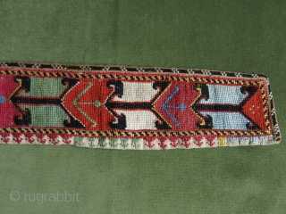 Uzbek Lakai silk cross stitch embroidered belt. Circa 1900-20. Size: 110 cm x 8 cm (43.5" x 3").               