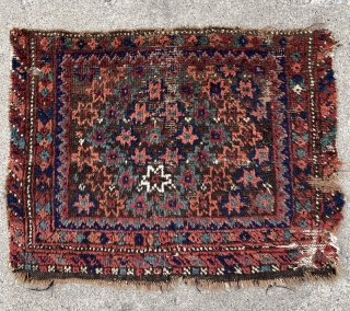 Baluch Bagface with lovely colors, shaggy pile with some corrosion and old moth nibbles, mixed wefting, cotton, wool and camel hair? - mete@yorukruggallery.com          
