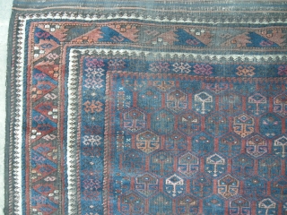 Antique Beluch rug c1900. 7ft x 3ft6 . This old Beluch is in need of a deep clean, there is good shiny wool under all the grime.The rug is in original condition  ...