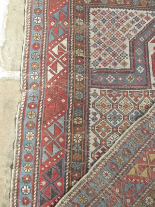 A good 19th century shirvan prayer rug in original condition needs a clean light wear and a few small holes but with ends and sides mostly in tact.     