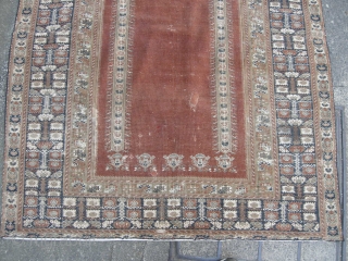 An Antique Giordes rug late 19th century , backed and ready to hang. Approx 4ft8 x 3ft8,                