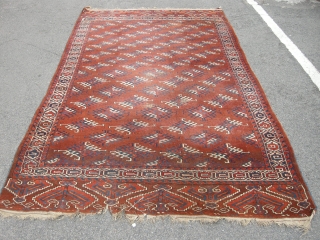 A good late 19th century Yomut carpet approx 9ft6 x 5ft6. Generally sound condition, some low area to the centre and damage to one end, can be repaired or used as is.  ...