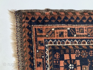 Unusual center medallion - Baluch Bag Face, woven in N.E Persia, circa 1870, measuring 2’ 2” x 2’ 2”.              