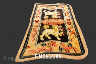 Antique Tibetan Saddle Rug with Fu-Dog Motif, 19th Century

98 × 57 cm (3' 2" × 1' 10")

An interesting and special piece.            