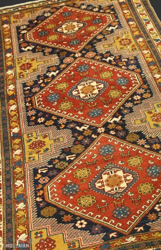 This is an antique Khila rug woven in the Caucasus mountains during the end of the 19th century circa 1880 and measures 173x 123CM in size. the field is designed with three  ...