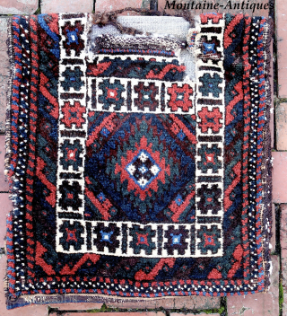 Small Sistan Baluch Khorgin-- approx 18 × 20” (each bag)
Plush folky Khorgin pair with striped kelim back.

Ex James Douglas personal collection. Mr. Douglas was a scholar and aficionado of Mideast tribal weaving.  ...