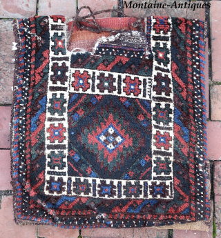 Small Sistan Baluch Khorgin-- approx 18 × 20” (each bag)
Plush folky Khorgin pair with striped kelim back.

Ex James Douglas personal collection. Mr. Douglas was a scholar and aficionado of Mideast tribal weaving.  ...