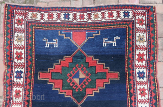 Open Field Gallery Kazak--4.6 × 8.9

Four latch hook medallions, large animal figures; star border. Plush pile and  open field.

CONDITION: Narrow guard at far end MIA. Small reweave/repair right front corner. Minor  ...