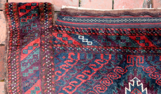 Sistan Baluch Khorgin Faces-- approx 29 × 30” 

Classic Sistan Khorgin faces with diamond medallion and piled side “bridges.” Thick and lustrous wool.

Ex James Douglas personal collection. Mr. Douglas was a scholar  ...