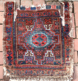   Sistan Baluch Khorgin Faces— approx 21 × 20”
 
Blue octagonal medallions. Possibly Salor Khani based on Turkoman choval elements.

Ex James Douglas personal collection. Mr. Douglas was a scholar and aficionado  ...