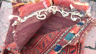  Baluch Chanta Khorgin Pair of Bags— approx 12 × 12”
 
Blue cross within diamond medallion. Well used little ethnographic textile.

Ex James Douglas personal collection. Mr. Douglas was a scholar and aficionado  ...