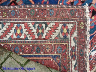 Bahktiari. 5 ft 4 in x 10 ft 2 in-- Gallery size piece from Chahar Mahal region. Good natural dyes will glow with surface wash. Open and uncluttered design indicates age. Sides  ...