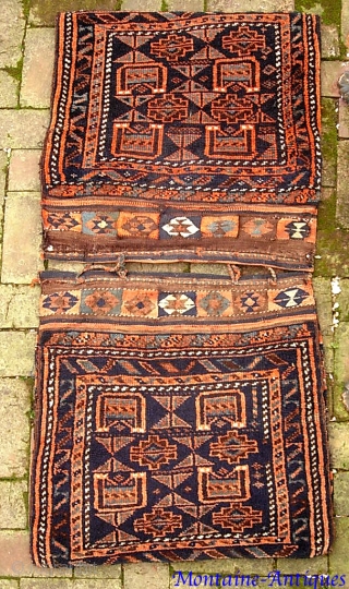 Kurdish Khorjin-- 24 x 24 in. (each)--This is a true pair;  they were originally joined together and used as double saddle bags then latercut apart and used as pillows. The natural  ...