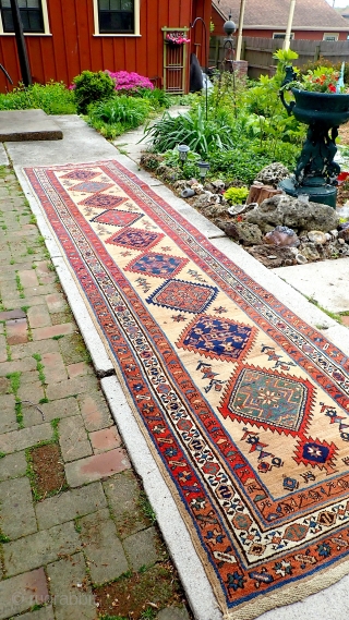 Serab-- 3.3 x 14.7. Beautiful bright/white old open field piece w/ archaic tribal elements and early date. Decorative old thing that will brighten up an otherwise long dark hallway. CONDITION: Braided ends  ...