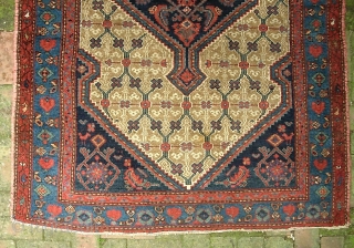 Kurdish Kolyai-- 4 ft 2 x 5 ft 11.  Kurdish camel medallion on wool foundation.  Classic lattice field with fine and somewhat unique drawing. Its a little bit tatty around  ...