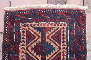 Sistan Baluchi Balisht Bedding Bag Face-- approx 18 x 35”

Possibly Zabol, Southeast Persia.  Camel field with unique rendition of pole/tree motif.  Very Good condition. Ex collection of the late James  ...