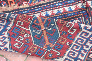 CAUCASIAN LENKORAN GALLERY RUG c. 19th cent--approx 4.6 x 9.6--Similar to Kazak but woven further east along the Caspian with dark weft and so-called Tosbaga (turtle) motifs--
Black oxidation mostly on far end  ...
