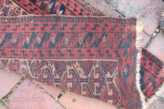 Baluchi Bedding Bag Face 19th cent-- approx 17 1/2 x 34”

Repetitive Turkoman design. Interesting ethnographic piece with Use-wear and damage as shown.           