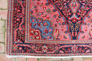 Fereghan Sarouk 19th cent-- 4.5 x 6.10 

Medallion with blue corners. Finely woven opulent old rug. Iron oxidation as shown. ($30 USA shipping)          