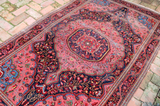 Fereghan Sarouk 19th cent-- 4.5 x 6.10 

Medallion with blue corners. Finely woven opulent old rug. Iron oxidation as shown. ($30 USA shipping)          