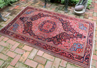 Fereghan Sarouk 19th cent-- 4.5 x 6.10 

Medallion with blue corners. Finely woven opulent old rug. Iron oxidation as shown. ($30 USA shipping)          