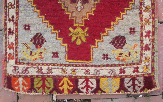 Turkish Yastik c. 19th cent-- approx 18 x 31 1/2”

Hearth medallion on red field with light blue corners. Interesting ethnographic piece with use-wear as shown. ($10 USA shipping)
     