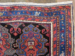 Afshar 4 ft 5 in by 6 ft 0 in.  An old and blingy looking tribal rug. The pile is good throughout. Someone must have really liked this rug because they  ...