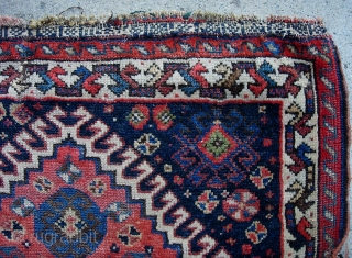 Qashqai 21 inches by 23 inches. Ancient little rug. Rough but still beautiful $12 to ship in usa.               