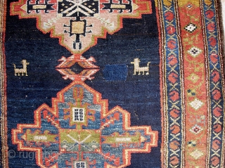 Old Bahktiari Runner-- 3 ft 5 inches by 14 ft. 2 inches. Nice long one. Wonderful thick tribal thing with animals. All natural dyes. Indigo ground but very colorful with lots of  ...