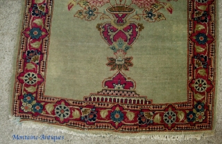 Kerman Pushti-  So called Lavar variety w/ Fine weave and short nap. Rare small size. Wonderful artistic composition with flower pot and green open field. Ends and sides are original with  ...