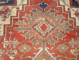 Serapi-- 8 ft 10 in x 12 ft 3 in. A legit antique rug, probably 19th century. It is very open and the medallion is proportionally huge.  Very interesting design and  ...