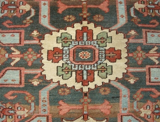 Serapi-- 8 ft 10 in x 12 ft 3 in. A legit antique rug, probably 19th century. It is very open and the medallion is proportionally huge.  Very interesting design and  ...