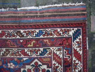 Afshar. 4 ft 0 inches by 5 ft 5 inches. Circa 1900 or earlier. Nomadic tribal piece has wide kelims at both ends. Interesting-- center warps are candy cane wool; peripheral warps  ...