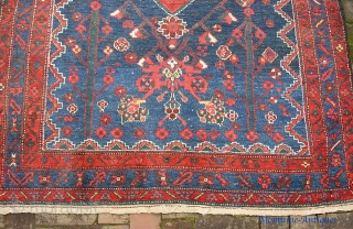 Kurdish-- 4 ft 10 inches x 7 ft 6 inches. Light tan wool foundation. Original braided end. Some pile wear and a bit of exposed foundation in the blue on one side  ...