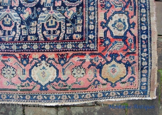 Senneh-- 5 ft 4 inches x 7 ft 10 inches. A well traveled old thing in larger format. Thin and finely woven. Exposed foundation all thru the rug-- tho it is hard  ...