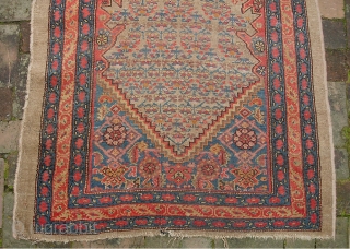 Camel Hamadan. 3 ft 2 inches by 10 ft 1 inches. Real old one-- possibly 19th century. Wool foundation. There are two old square reweaves. Even low pile and a couple small  ...