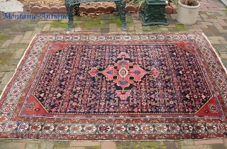 Squarish Hamadan-- 5 ft 4 inches x 6 ft 8 inches. One of two similar from same yard sale. Exceptionally decorative with great colors... especially rose medallion and madder corners. Alas... some  ...