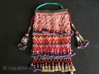 Uzbekistan small bag. Silk tassels and trade glass beads. Size: height with tassels 9.8" - 25 cm and width 5.5" - 14 cm.          