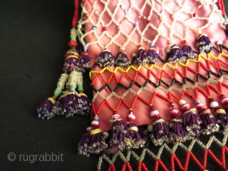 Uzbekistan small bag. Silk tassels and trade glass beads. Size: height with tassels 9.8" - 25 cm and width 5.5" - 14 cm.          