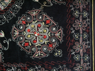 Central Asia, Kirghiz wall or bedding pile hanging. Silk very fine chain stitch embroidery on velvet with traditional wild crocus floral designs.. Circa 1920-30s. Size: 50" x 53" - 127cm x 136cm. 