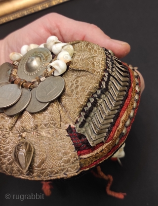 Afghan childs hat with coins.                            