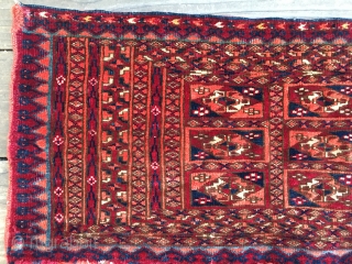 Antique Tekke Turkoman Torba, circa 1900. Good range of colors including a light blue. One possibly synthetic but no bleeding. Nice glossy wool in full pile. Has remnents of tassles. No repairs  ...