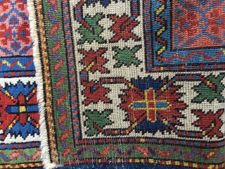 Antique Caucasian Kuba rug circa 1890. Very good condition. All natural saturated colors including yellow, a brilliant green and bright blues Medium/low to near full pile. Nice abrash in field. Original selvedges.  ...