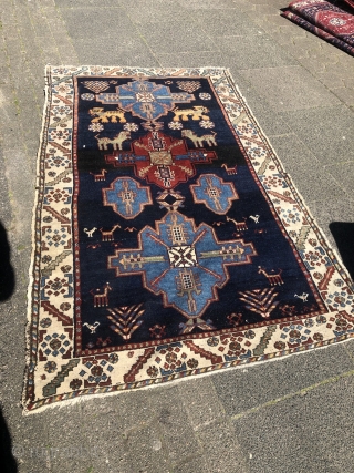 Look at the lions and giraffes in this playful and lovely antique Persian Bakhtiary tribal rug, size: 195x120cm / 6'4''ft x 4ft           